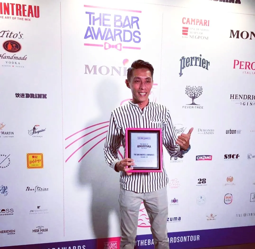 Barstylez founder Shahmil Lin holding his Bar Awards Luminaries plaque