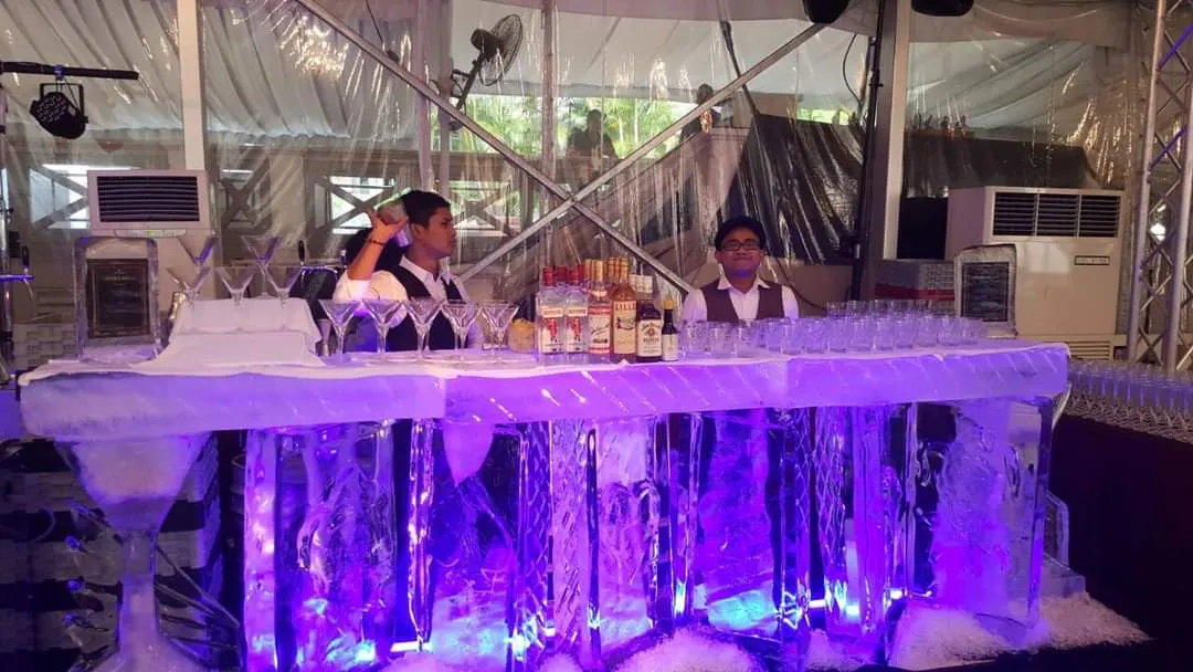Barstylez bar lit in purple at an evening event