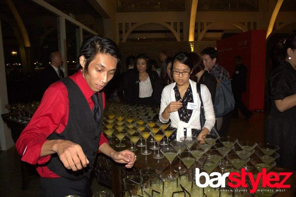 Barstylez flair bartender performing a bottle trick